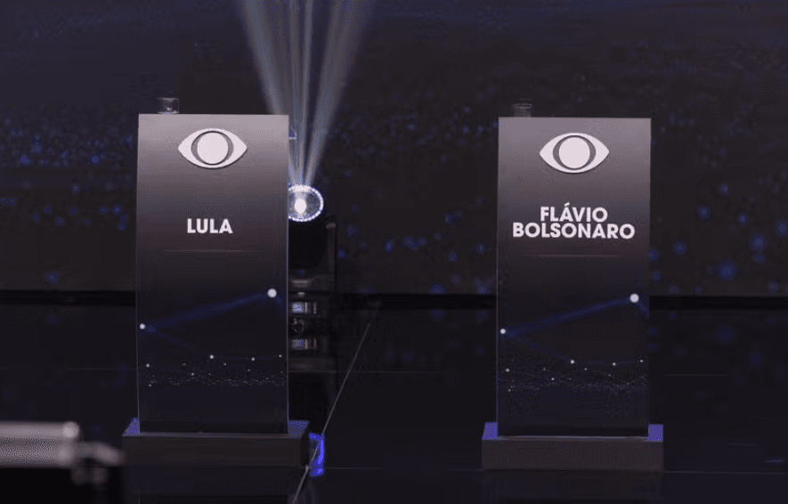 DEBATE NA BAND: Lula e Flávio Bolsonaro terão 30 minutos de confronto direto neste domingo (18)