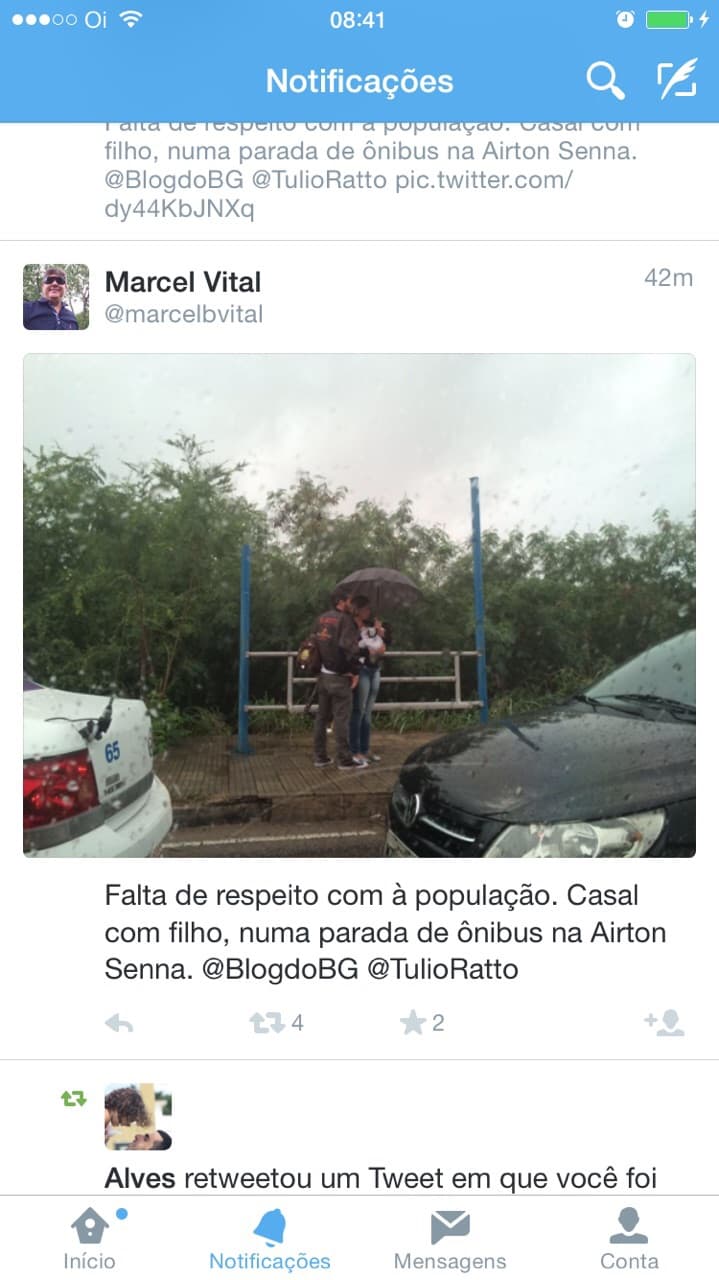 FALTA DE RESPEITO (FOTO): Casal com filho de colo, em ponto de ônibus sem cobertura na Ayrton Senna