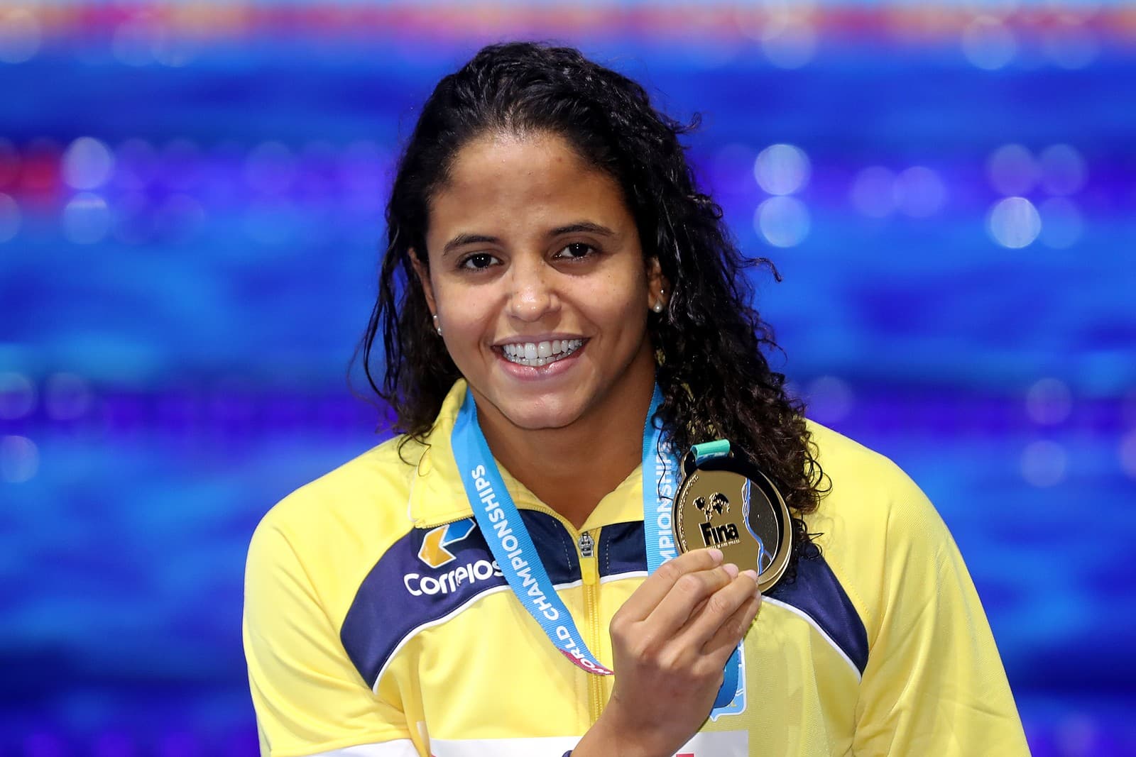 NATAÇÃO - (Eterna em um centésimo): Etiene bate chinesa e vira 1ª campeã mundial do país